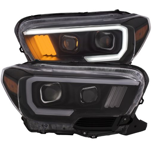 Bild på ANZO 2016 - 2017 Toyota Tacoma Projector Headlights w Plank Style Black w Amber